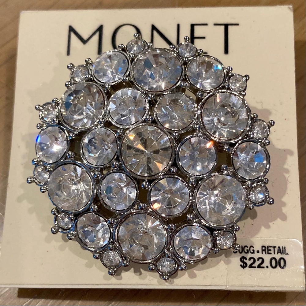NWT Vintage Monet round silver tone rhinestone brooch. Very sparkly.